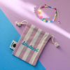 Perlenarmband Schulkind in bunt mit Säckchen dunkelrosa/weiß